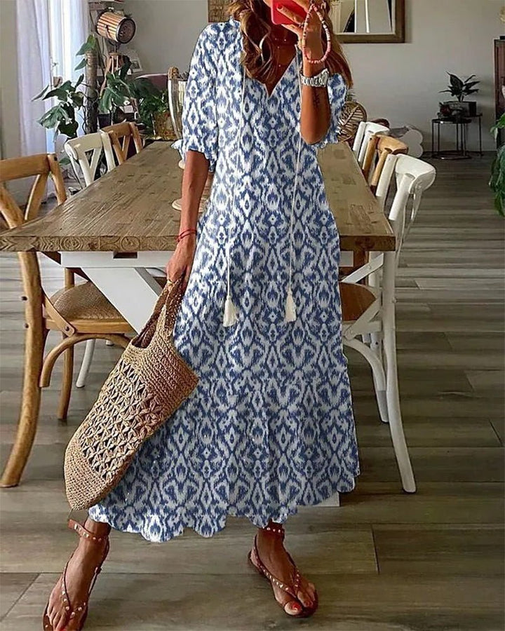 Abito boho elegante fluido con stampa geometrica per donna