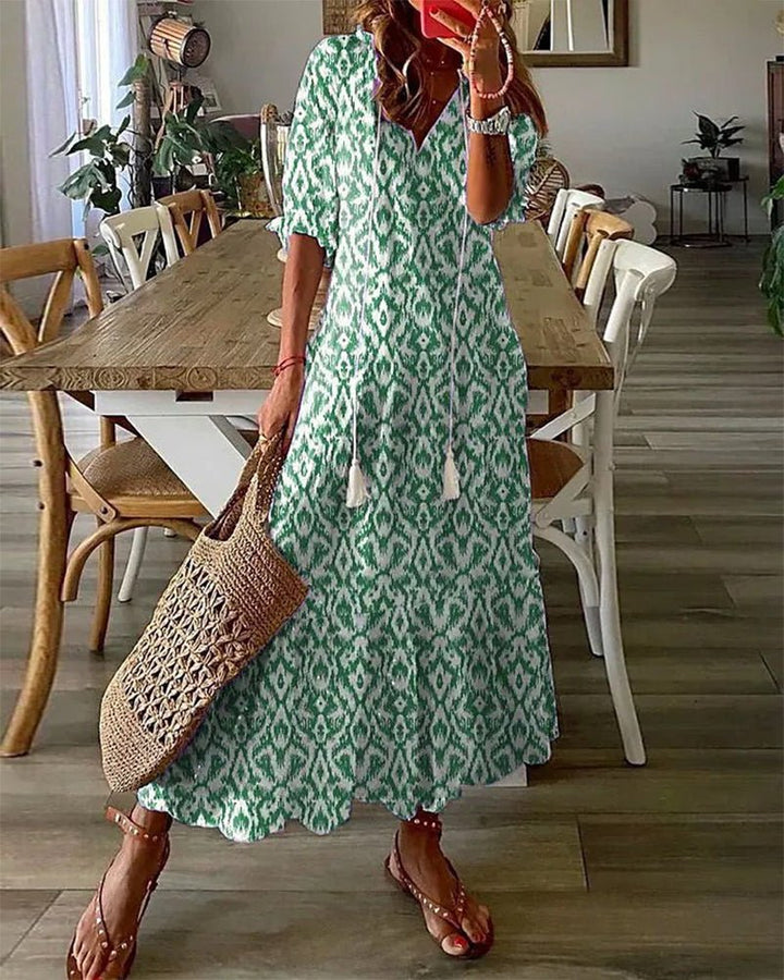 Abito boho elegante fluido con stampa geometrica per donna