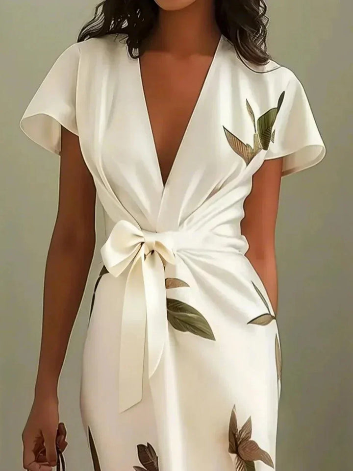 Abito portafoglio donna elegante con stampa botanica