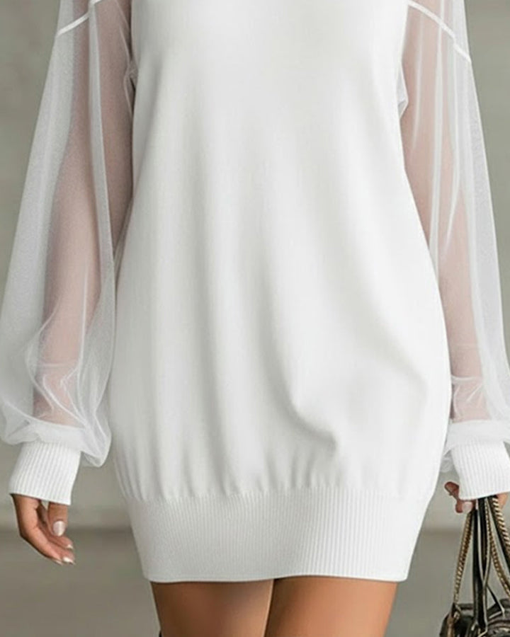 Abito elegante in maglia con maniche in tulle trasparente per donna