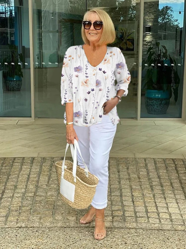 Blusa donna floreale elegante effetto snellente