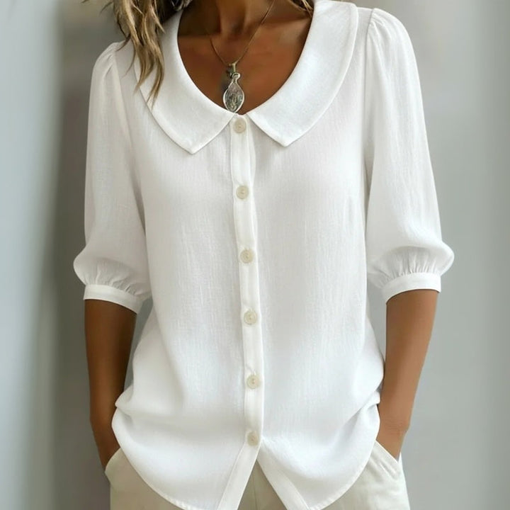 Blusa elegante tinta unita con colletto e bottoni per donna