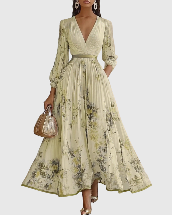 Abito lungo plissettato da donna elegante e fluido floreale