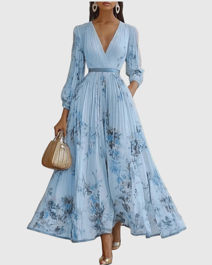 Abito lungo plissettato da donna elegante e fluido floreale