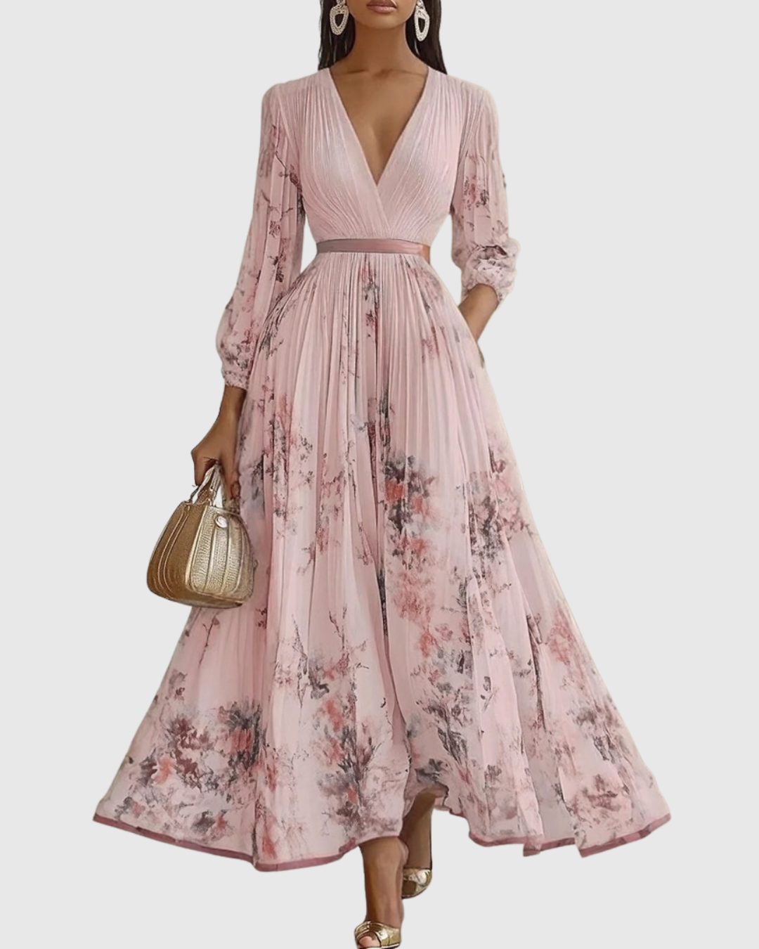 Abito lungo plissettato da donna elegante e fluido floreale