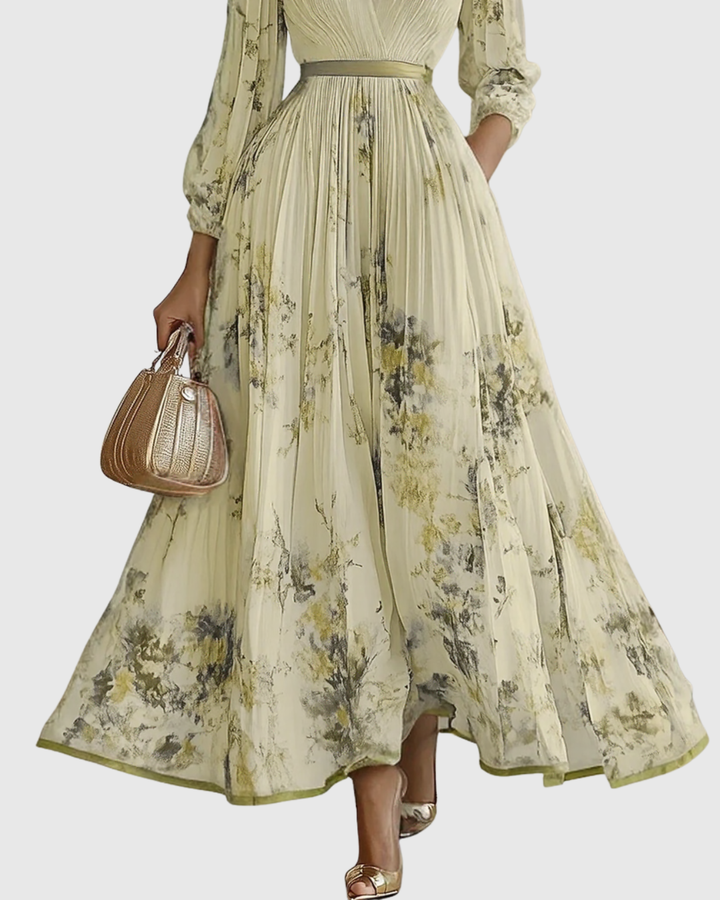 Abito lungo plissettato da donna elegante e fluido floreale