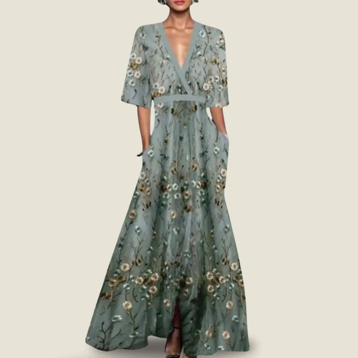 Abito floreale elegante e fluido per donna