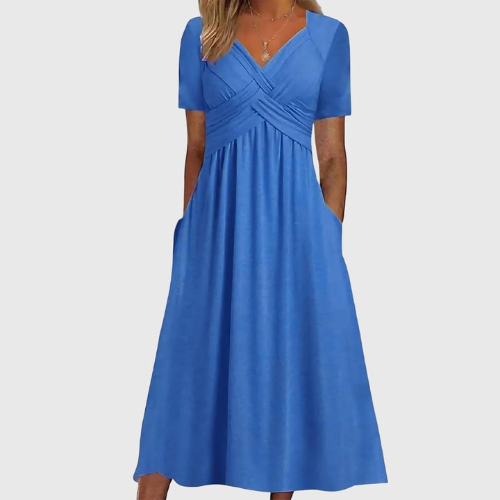 Abito midi elegante con effetto contenitivo e vestibilità fluida per donna