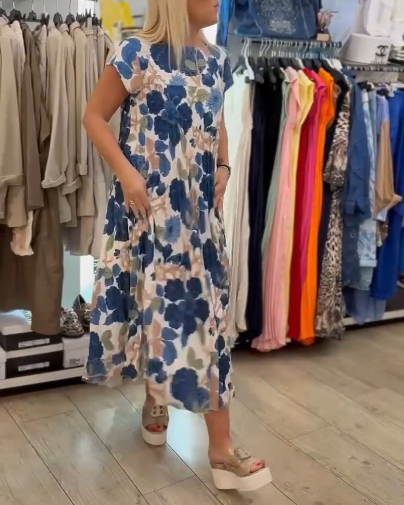 Elegancka sukienka z okrągłym dekoltem w kwiaty