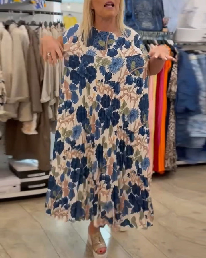 Elegancka sukienka z okrągłym dekoltem w kwiaty