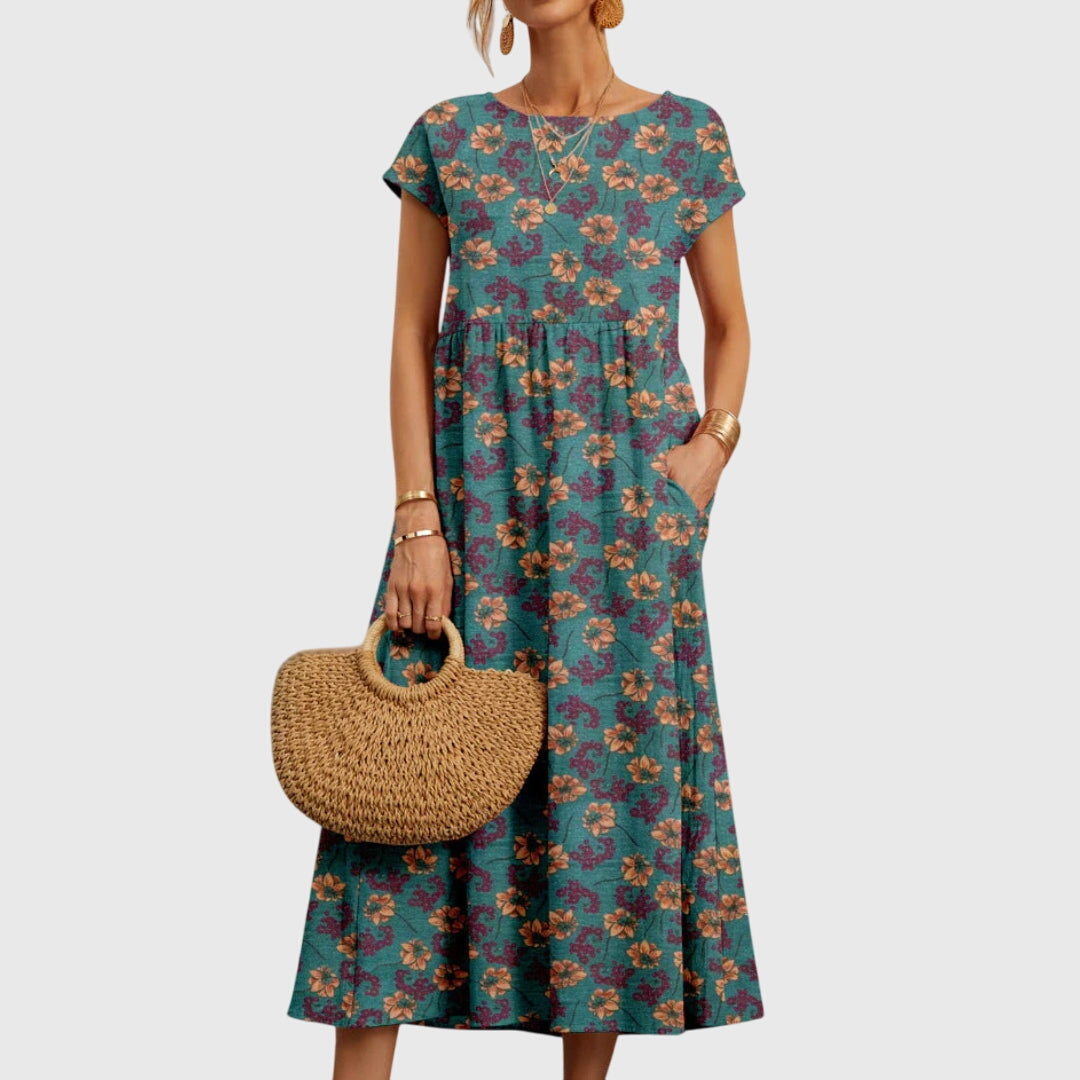 Abito floreale elegante e fluido per donna