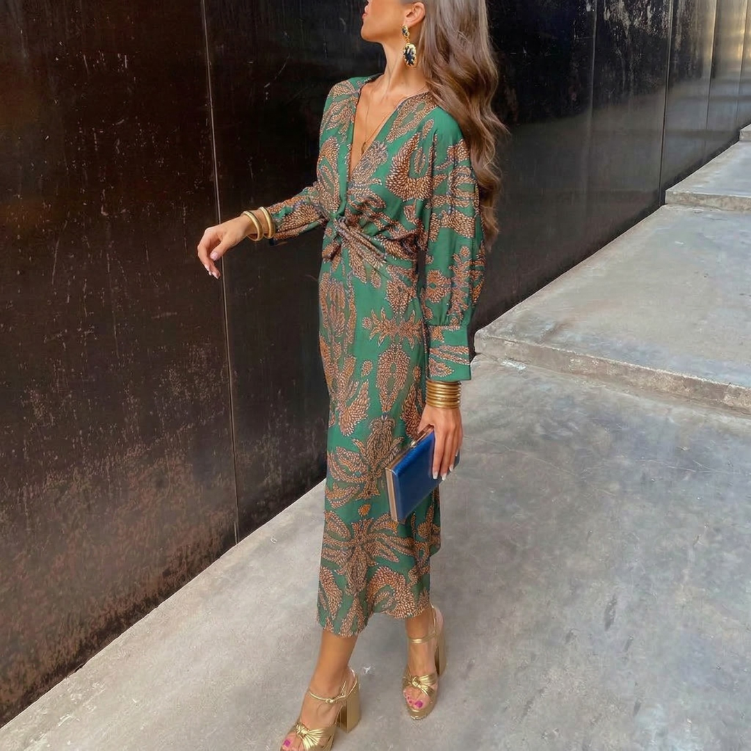 Abito midi fluido da donna elegante con stampa e scollo a V