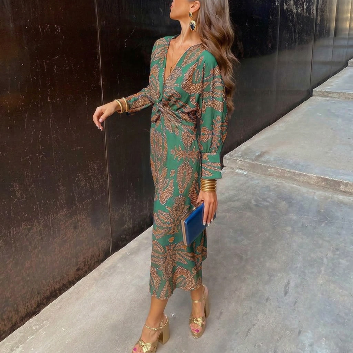Abito midi fluido da donna elegante con stampa e scollo a V
