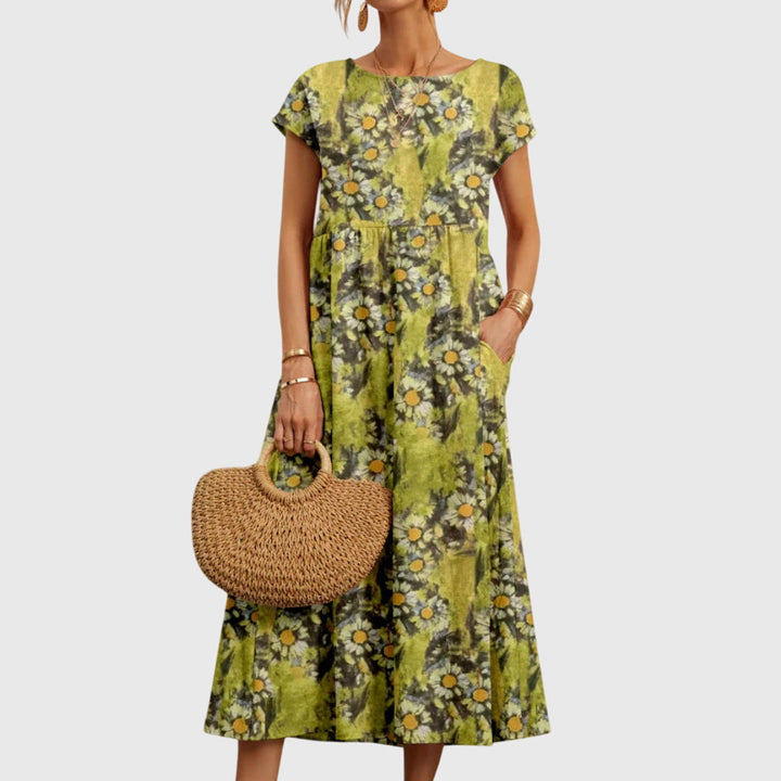Abito floreale elegante e fluido per donna