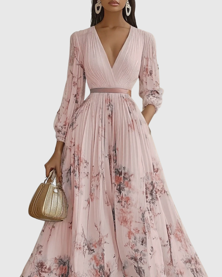 Abito lungo plissettato da donna elegante e fluido floreale