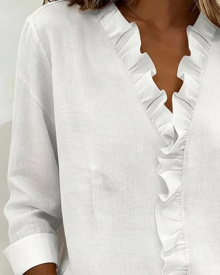 Blusa elegante da donna con scollo a V e volant