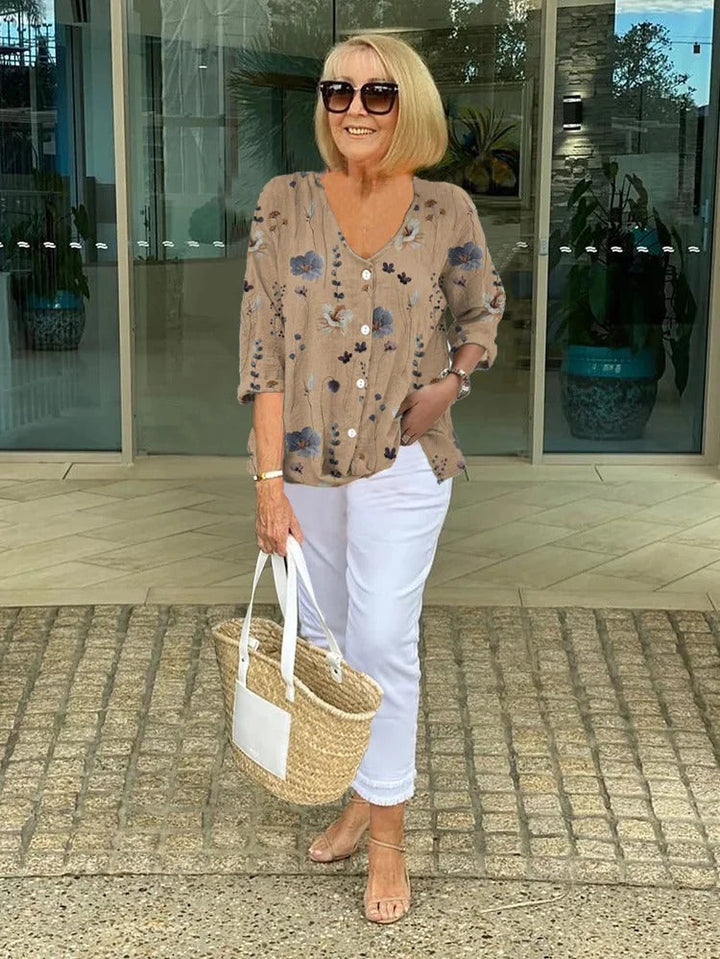 Blusa donna floreale elegante effetto snellente