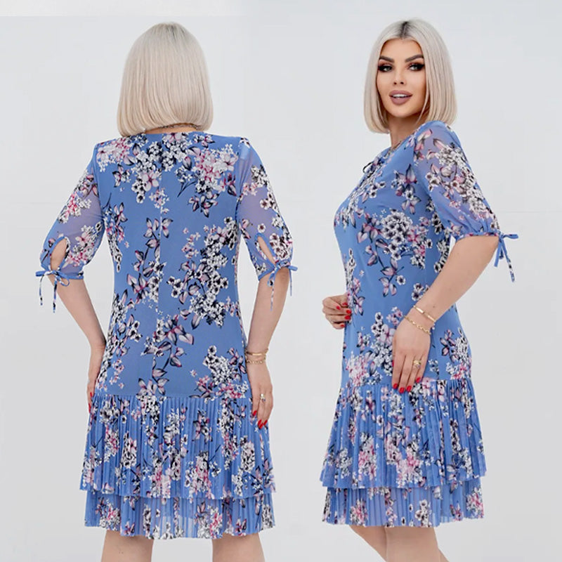 Abito floreale donna elegante con gonna plissé