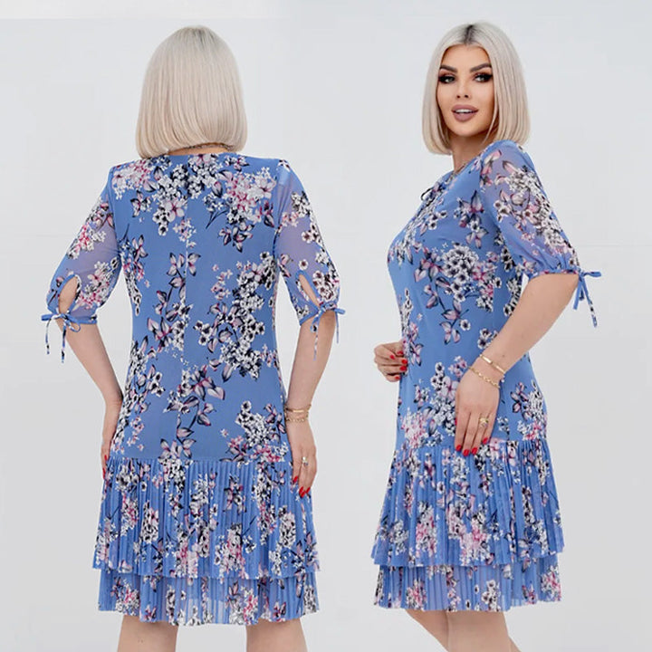Abito floreale donna elegante con gonna plissé