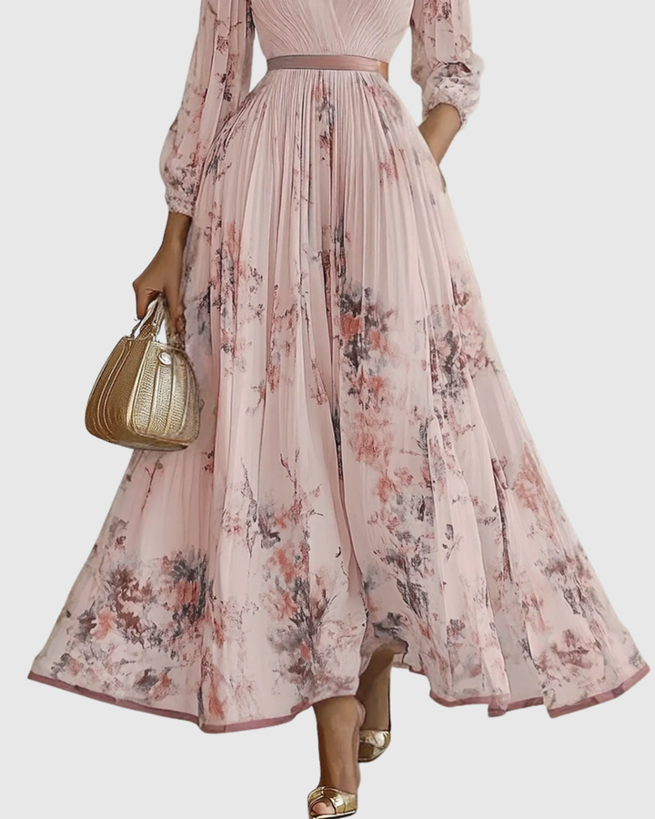 Abito lungo plissettato da donna elegante e fluido floreale