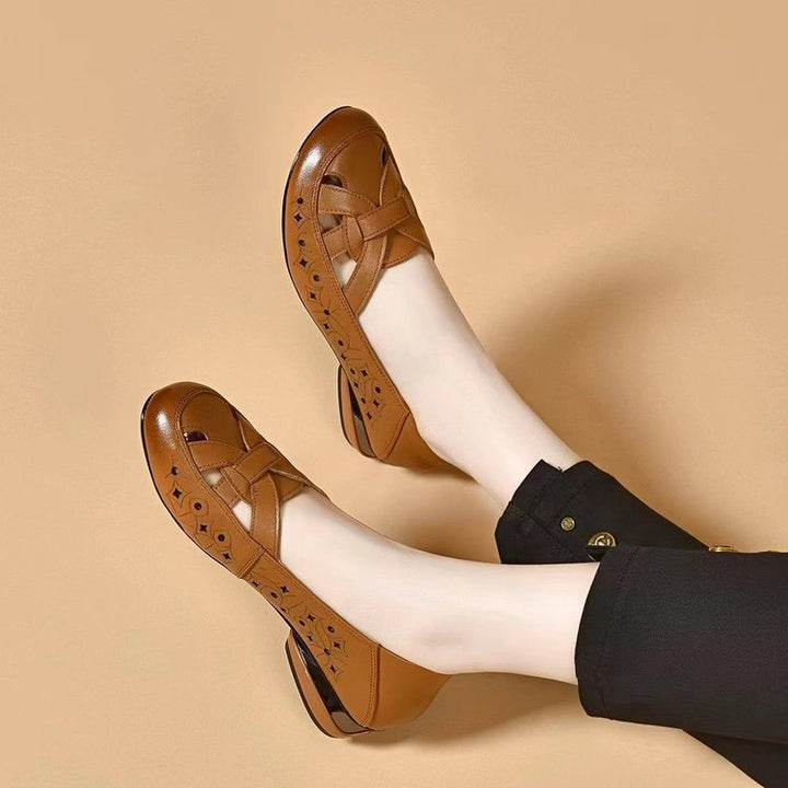 Scarpe slip-on in pelle traforata comode per donna