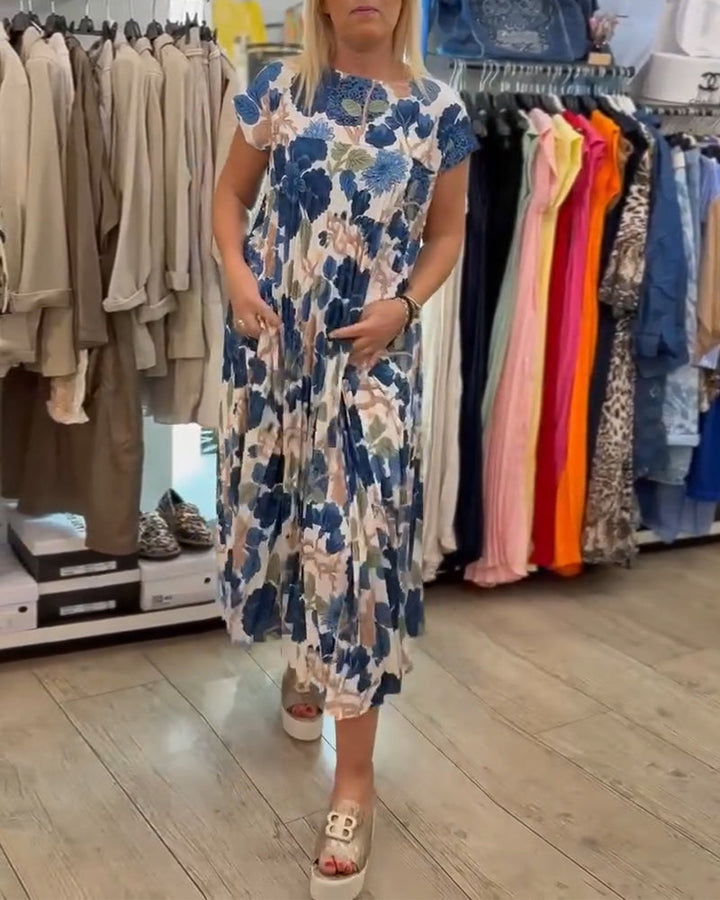 Elegancka sukienka z okrągłym dekoltem w kwiaty