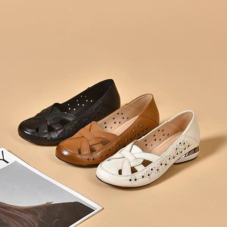 Scarpe slip-on in pelle traforata comode per donna