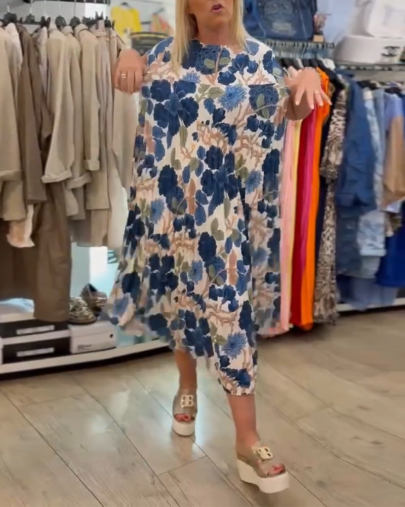 Elegancka sukienka z okrągłym dekoltem w kwiaty