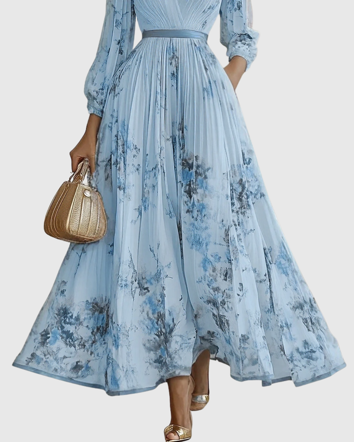 Abito lungo plissettato da donna elegante e fluido floreale