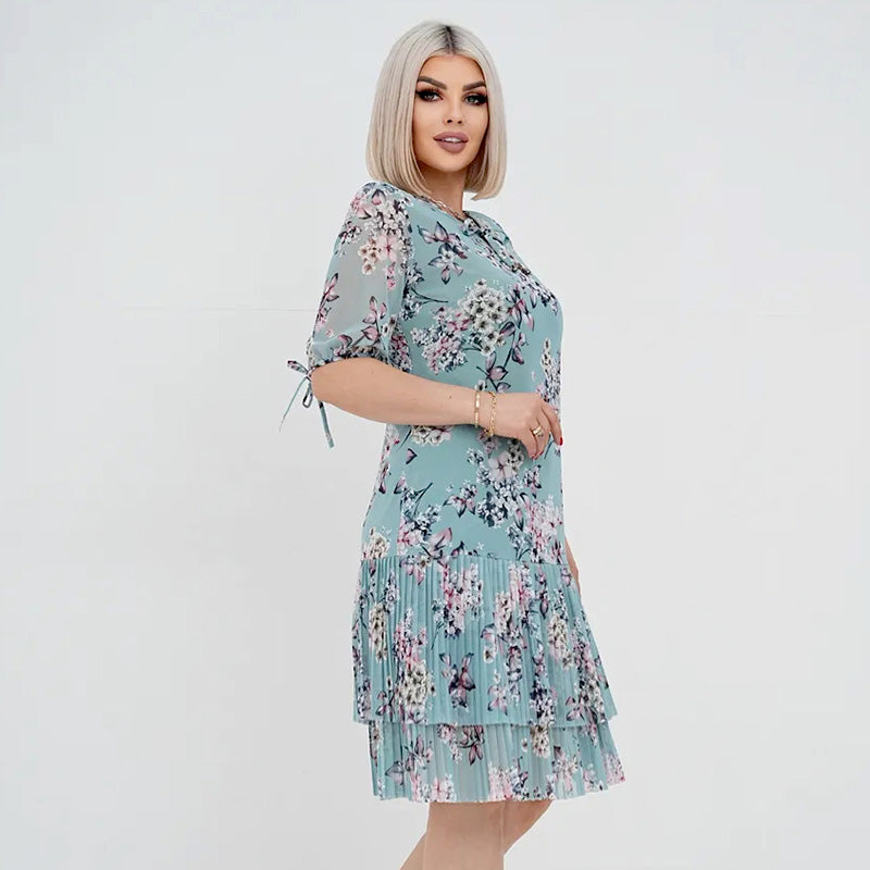 Abito floreale donna elegante con gonna plissé