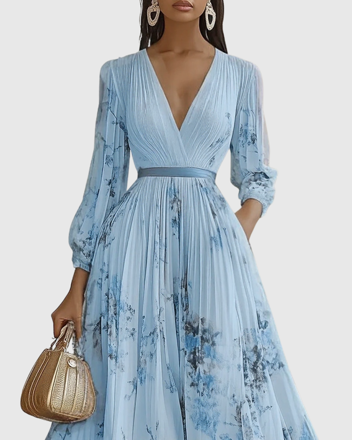 Abito lungo plissettato da donna elegante e fluido floreale