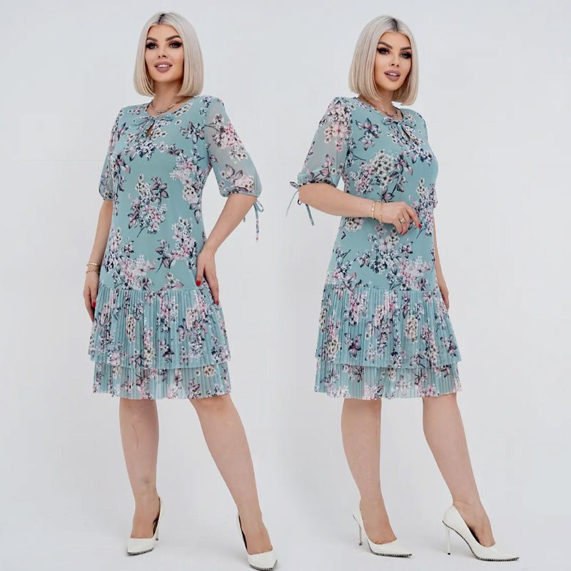 Abito floreale donna elegante con gonna plissé