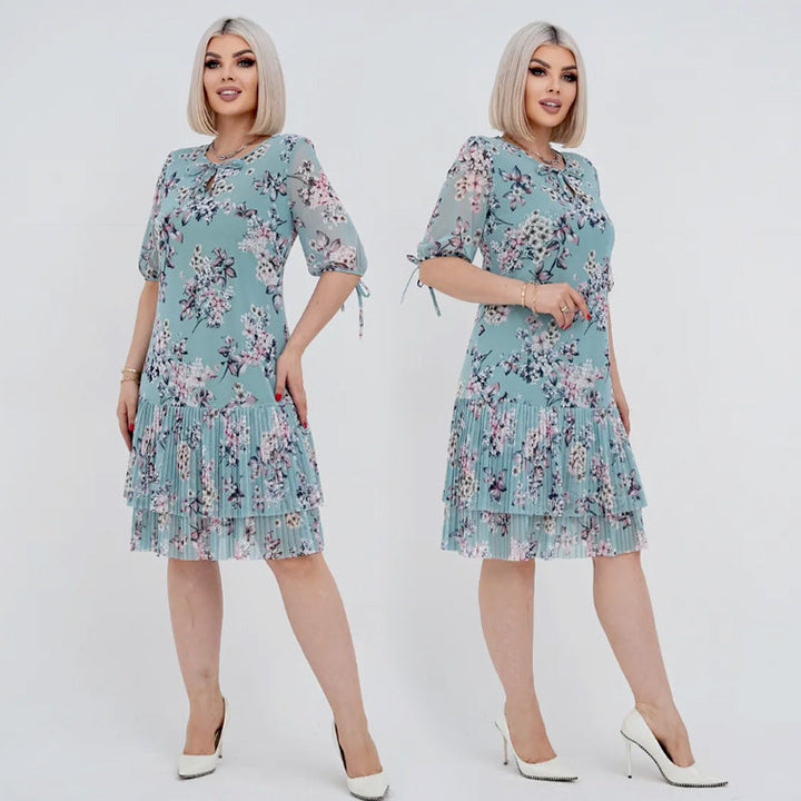 Abito floreale donna elegante con gonna plissé