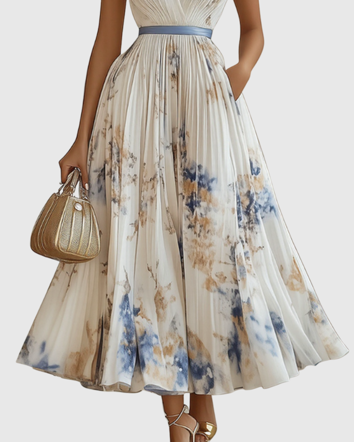 Abito lungo plissettato da donna elegante e fluido floreale