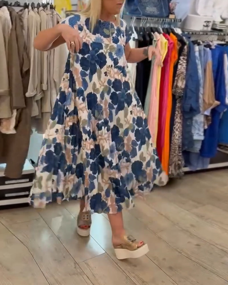 Elegancka sukienka z okrągłym dekoltem w kwiaty
