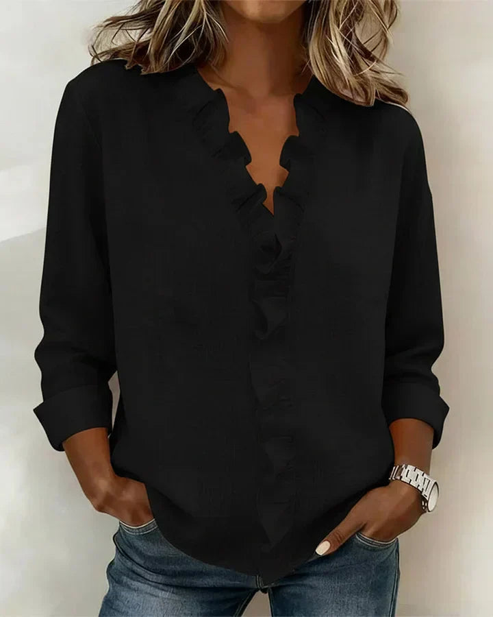 Blusa elegante da donna con scollo a V e volant