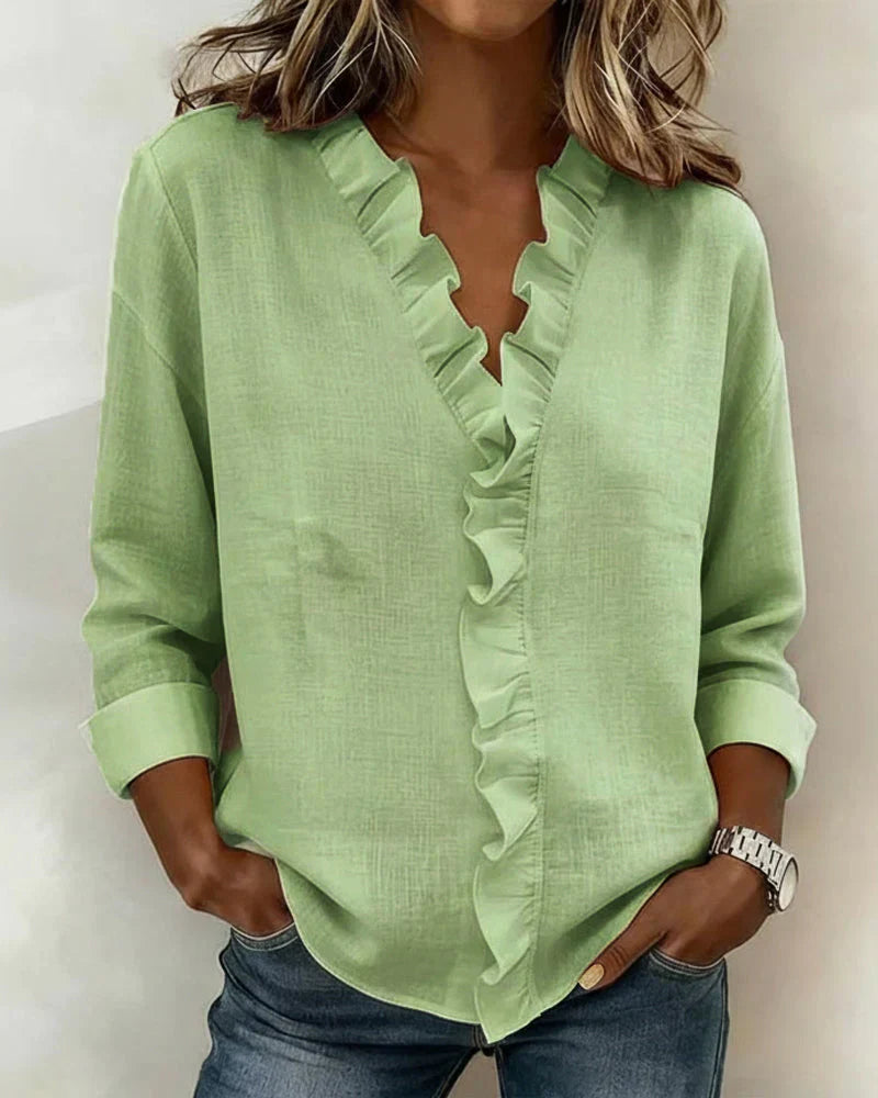 Blusa elegante da donna con scollo a V e volant
