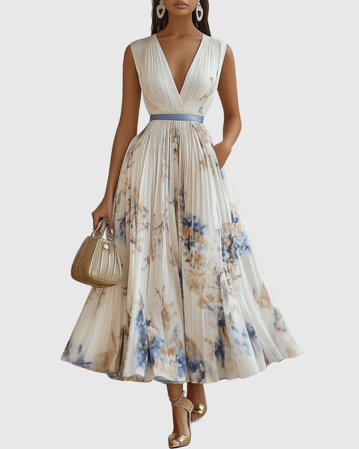 Abito lungo plissettato da donna elegante e fluido floreale