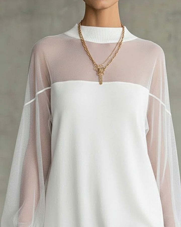 Abito elegante in maglia con maniche in tulle trasparente per donna