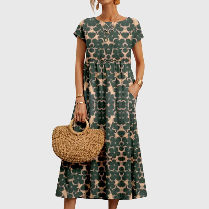Abito floreale elegante e fluido per donna
