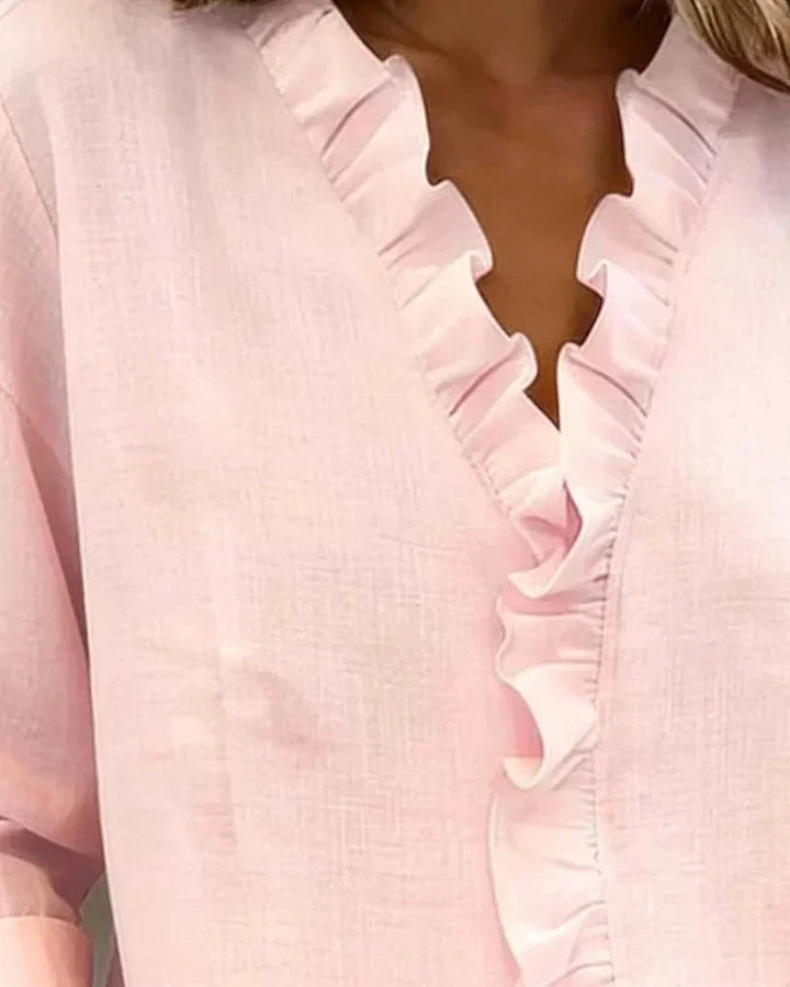 Blusa elegante da donna con scollo a V e volant