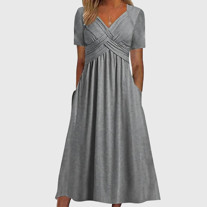 Abito midi elegante con effetto contenitivo e vestibilità fluida per donna