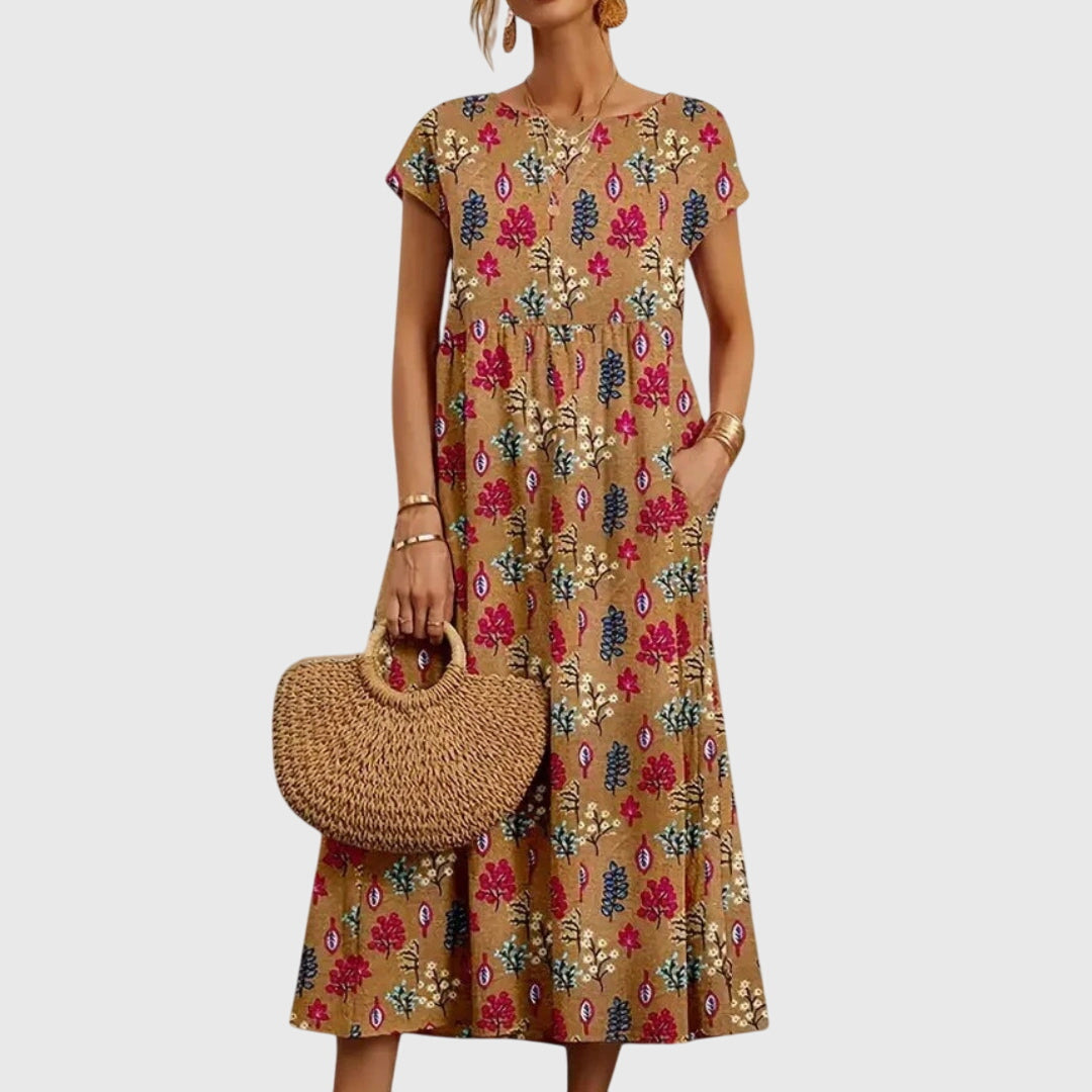 Abito floreale elegante e fluido per donna