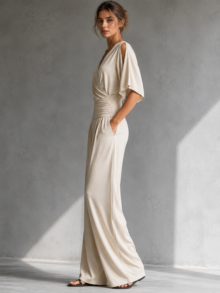 Tuta donna elegante con pantaloni palazzo e scollo a V