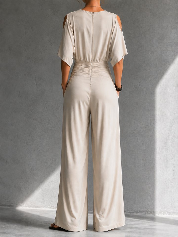 Tuta donna elegante con pantaloni palazzo e scollo a V