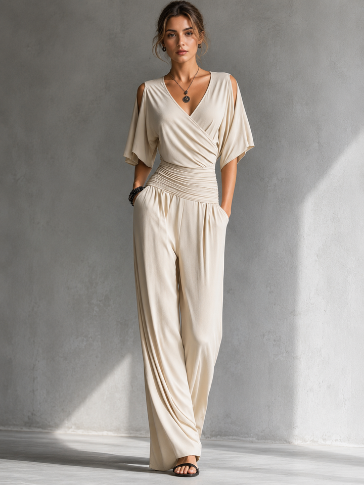 Tuta donna elegante con pantaloni palazzo e scollo a V