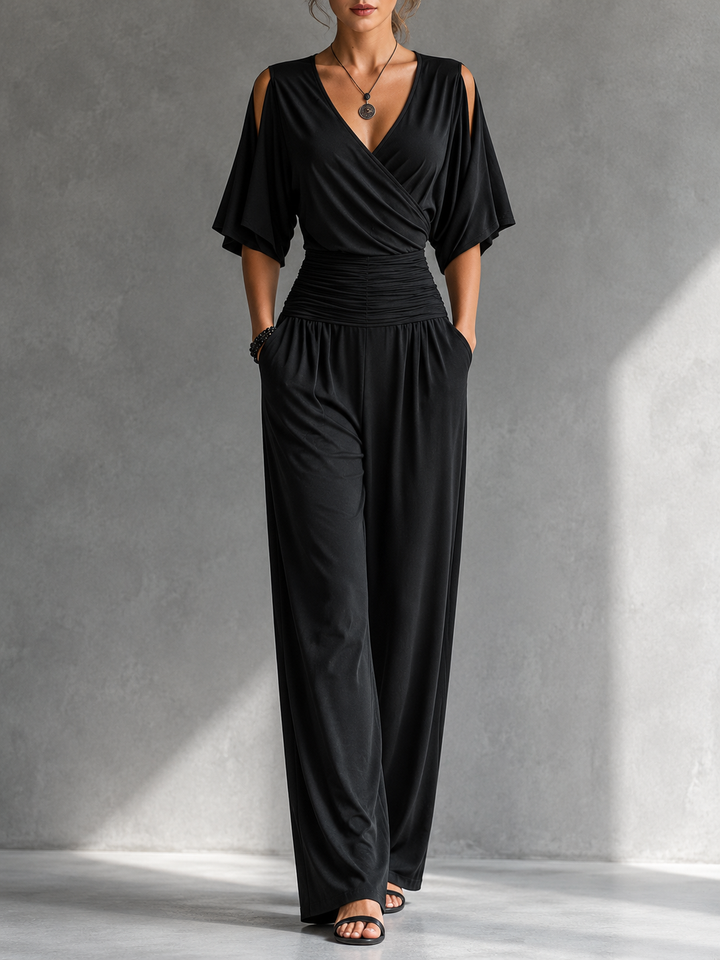 Tuta donna elegante con pantaloni palazzo e scollo a V
