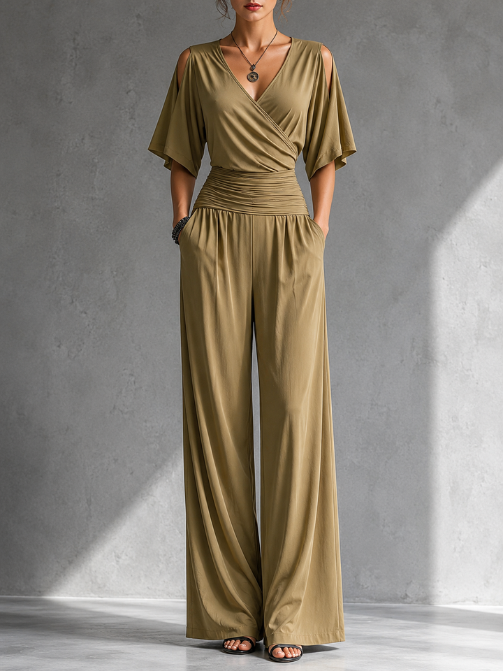 Tuta donna elegante con pantaloni palazzo e scollo a V