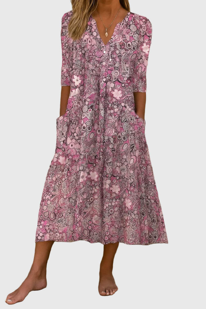 Abito midi fluido elegante da donna con scollo a V