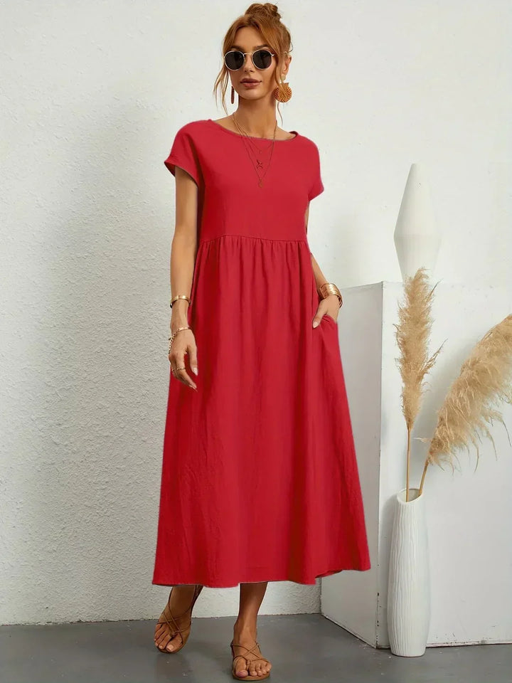 Abito midi elegante fluido e senza tempo per donna